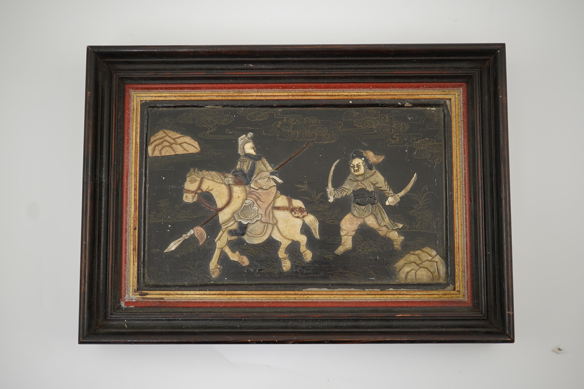 A Chinese lacquer, soapstone, mother-of-pearl and bone overlaid panel, 18th/19th century